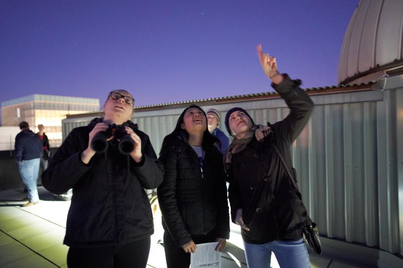 Students at a Star Party on the roof of Smith Lab